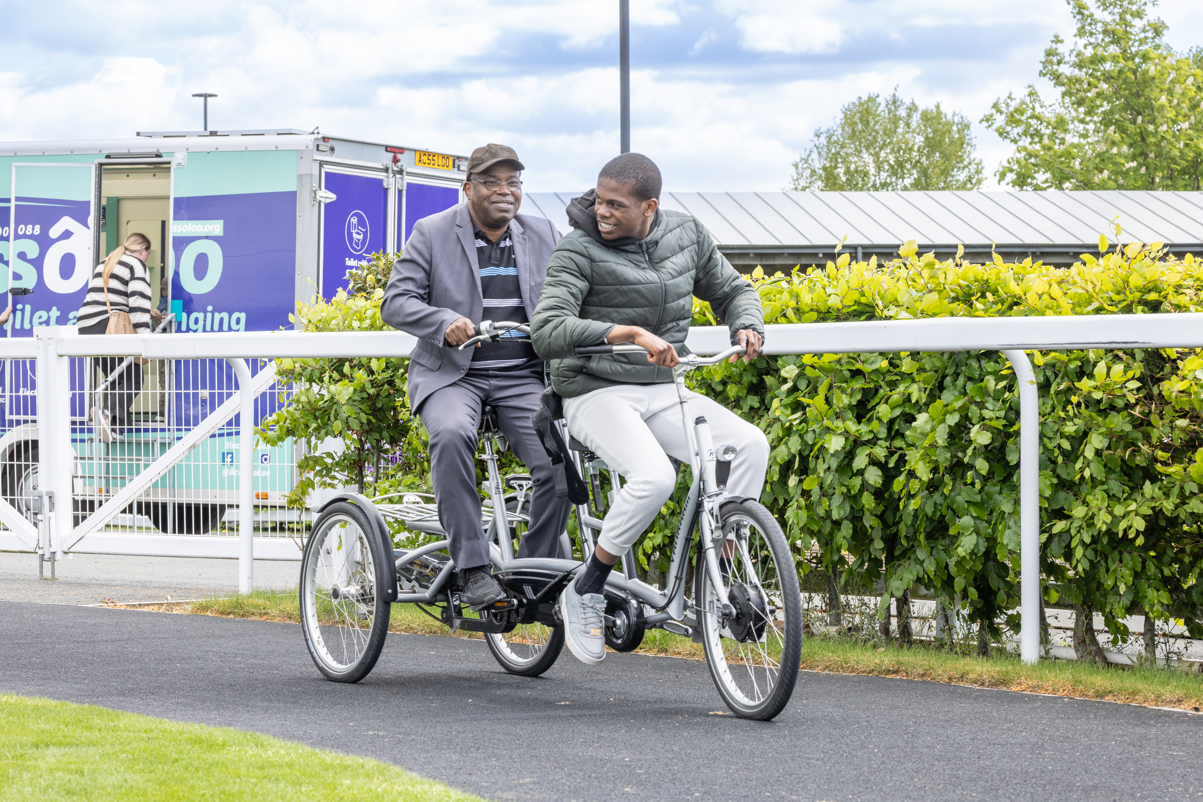 People on tandem bike.